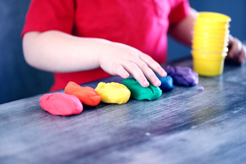 child-making-clay-figures